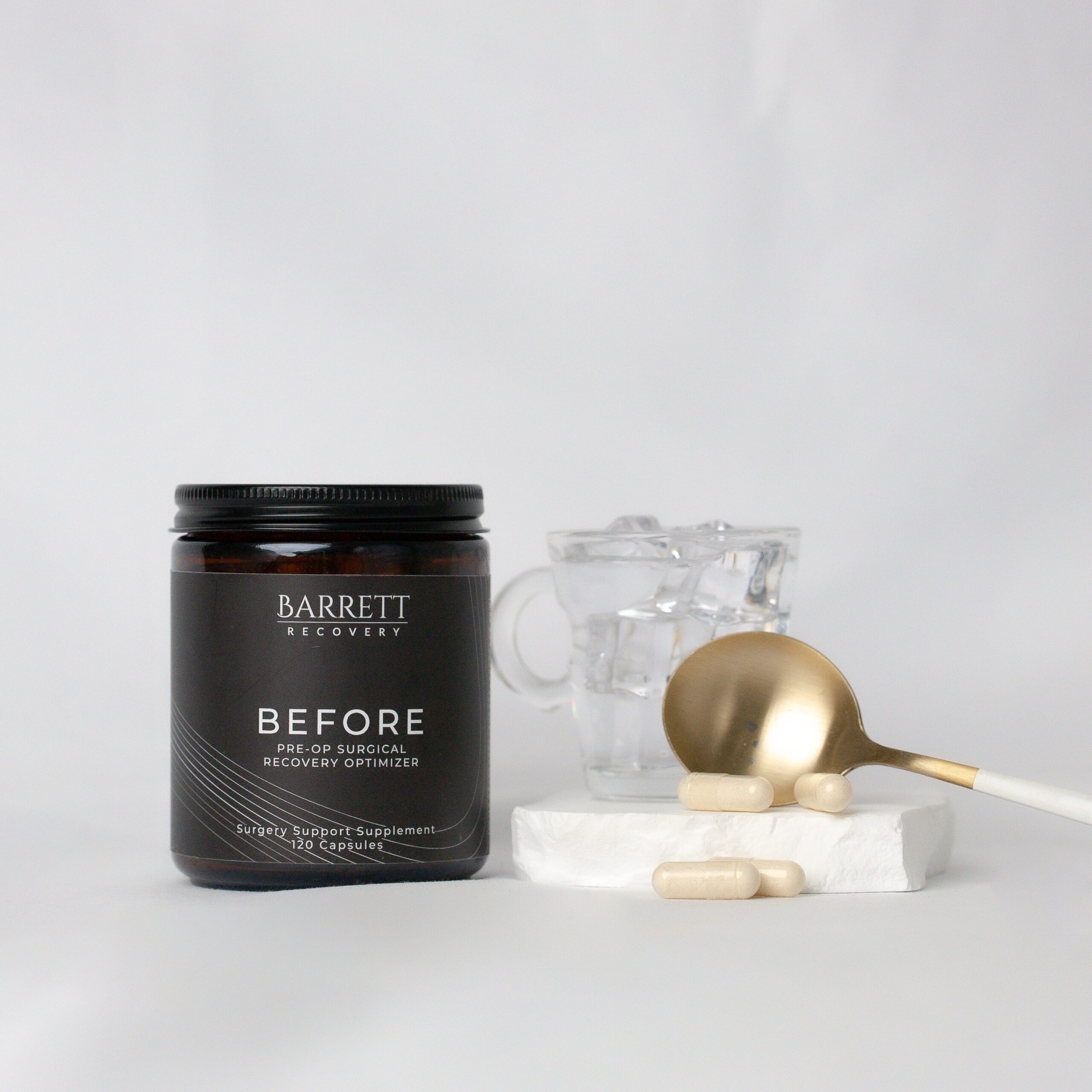 BEFORE Pre-op surgical recovery optimizer surgery support supplement 120 capsules with a glass of water next to the supplement