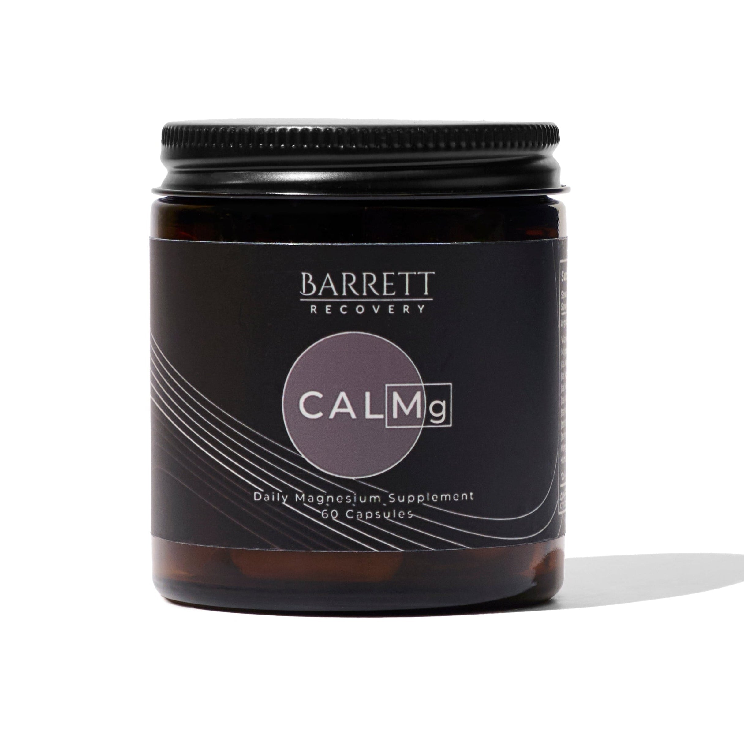 A jar of CALMg Daily Magnesium Supplement with a black and dark label design, placed against a white background.