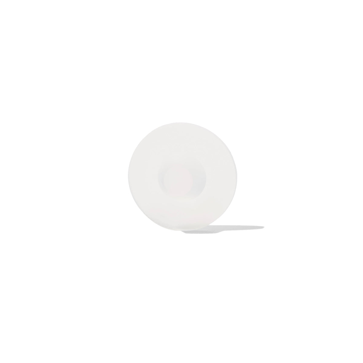 A white, round belly button shaper with a central incision, designed for post-surgical use.