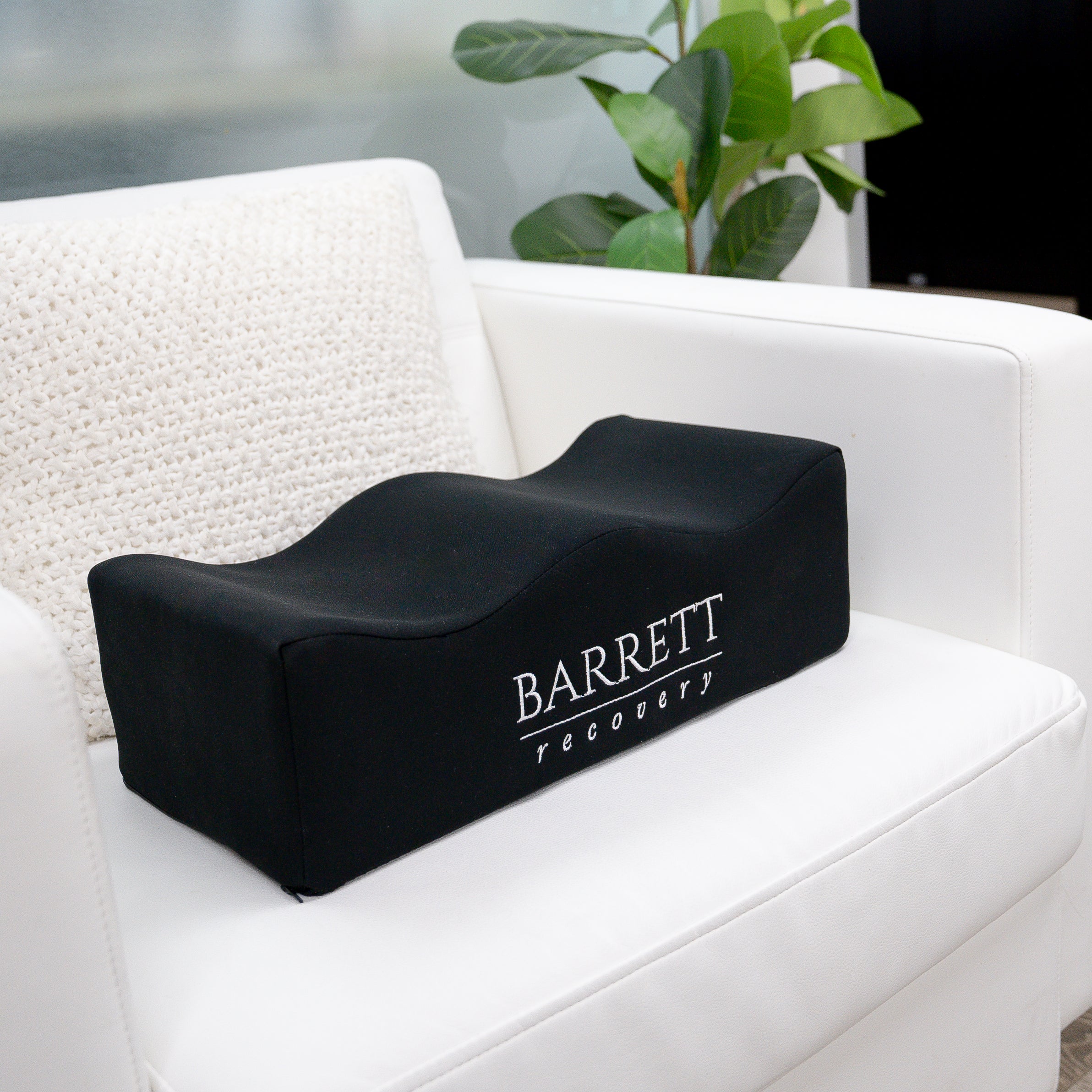 Barrett Recovery Brazilian Butt Lift Support Pillow on a white couch