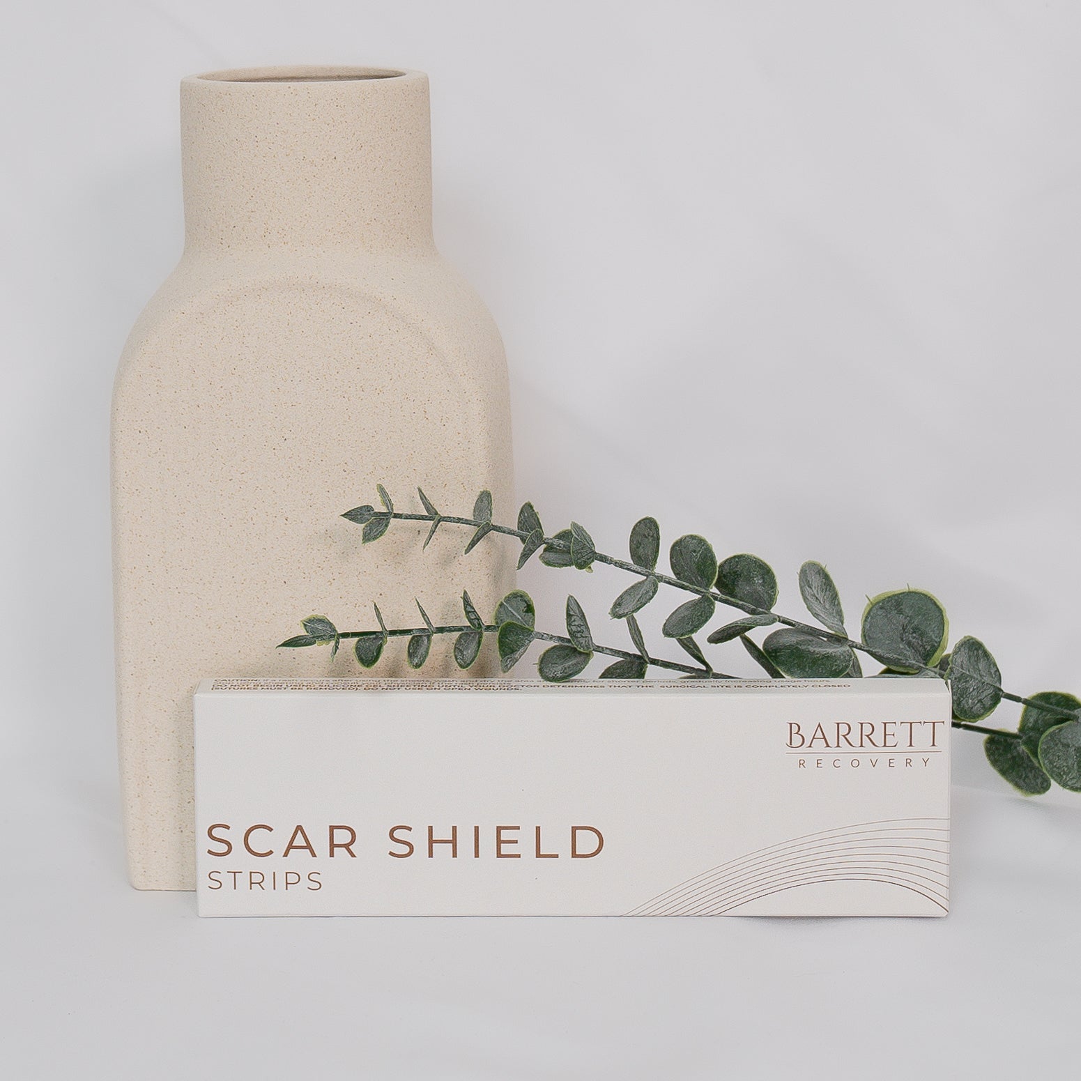 Scar shield strips next to eucalyptus 